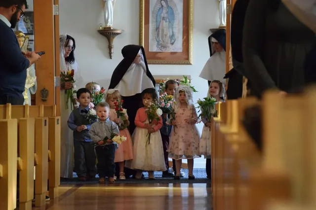 Children taking part in a Marian procession.