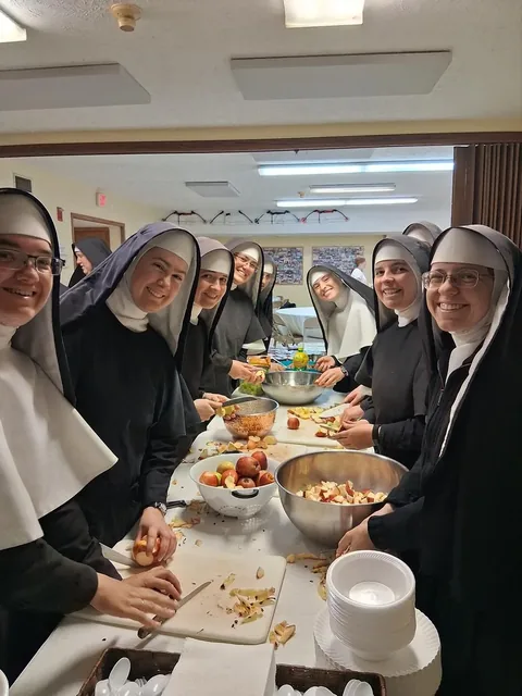 The Sisters preparing food together.